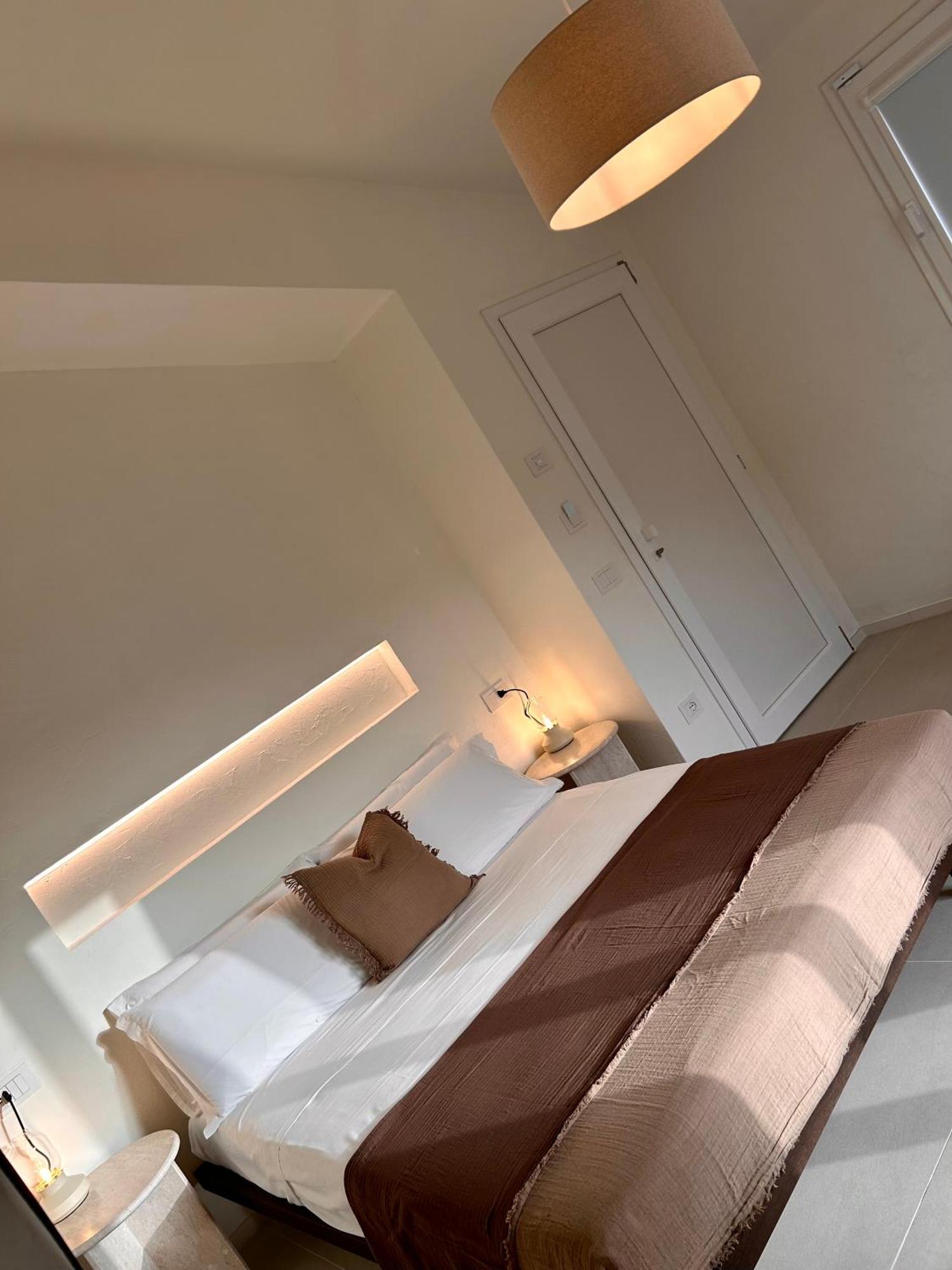 Vireo Rooms Santa Maria Navarrese Bagian luar foto